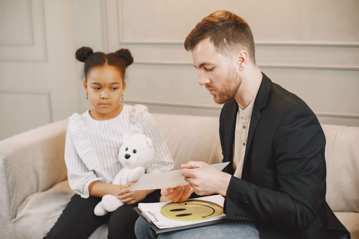 A therapist working one-on-one with a child