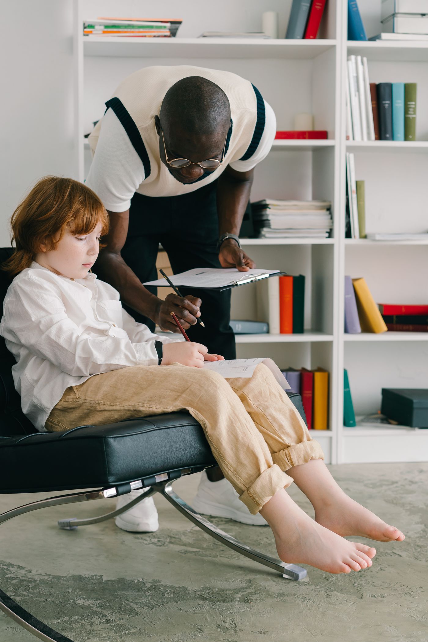 A child engaged in a guided learning activity